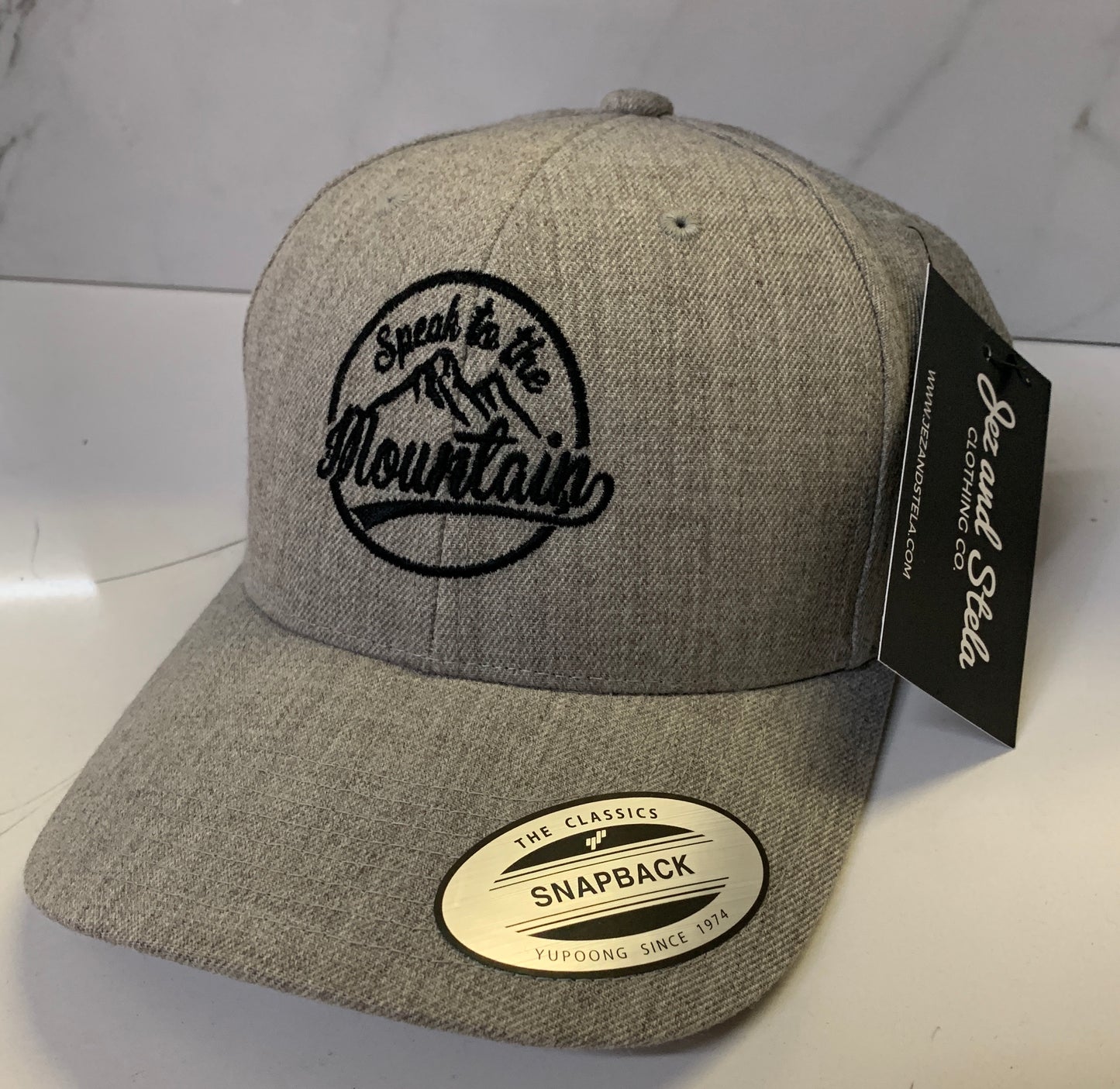 Speak to the Mountain- (Heather Grey) YP Classics™ Premium Curved Visor Snapback Cap